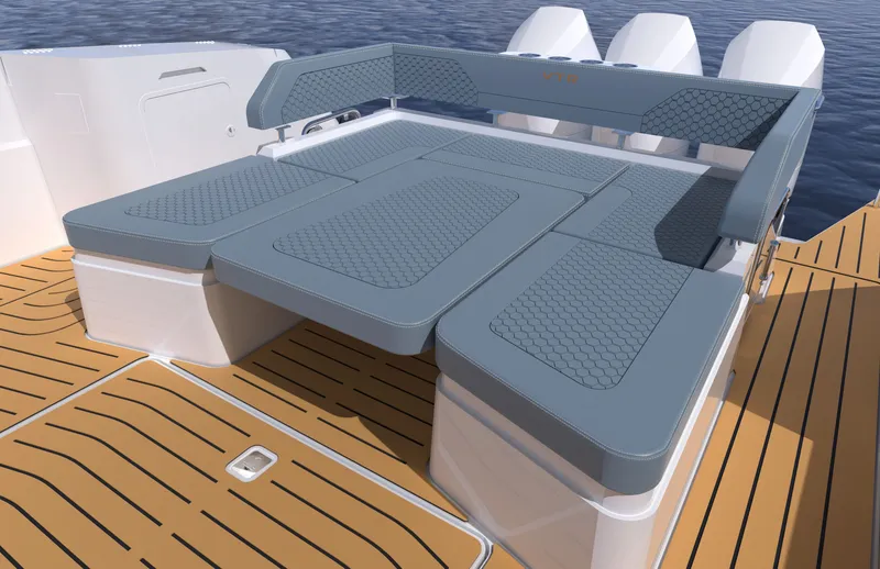 Slide: The Image of The 2027 Cruisers Yachts 45 VTR features a modern, cushioned sun deck on a sleek wooden deck. - 29