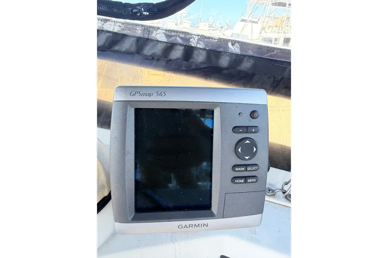 Slide: The Image of Garmin GPSmap 545 on 1994 Skipjack 262 Flybridge boat dashboard. - 44