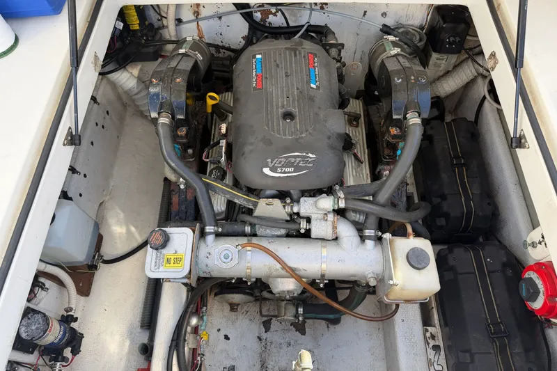 Slide: The Image of The engine compartment of a 1994 Skipjack 262 Flybridge with a Vortec 5700 engine. - 32