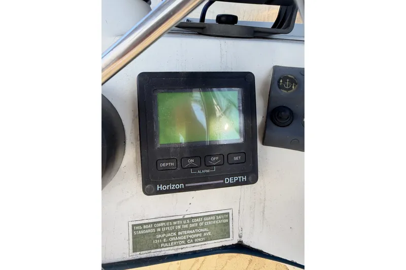 Slide: The Image of Depth gauge on 1994 Skipjack 262 Flybridge boat dashboard. - 45
