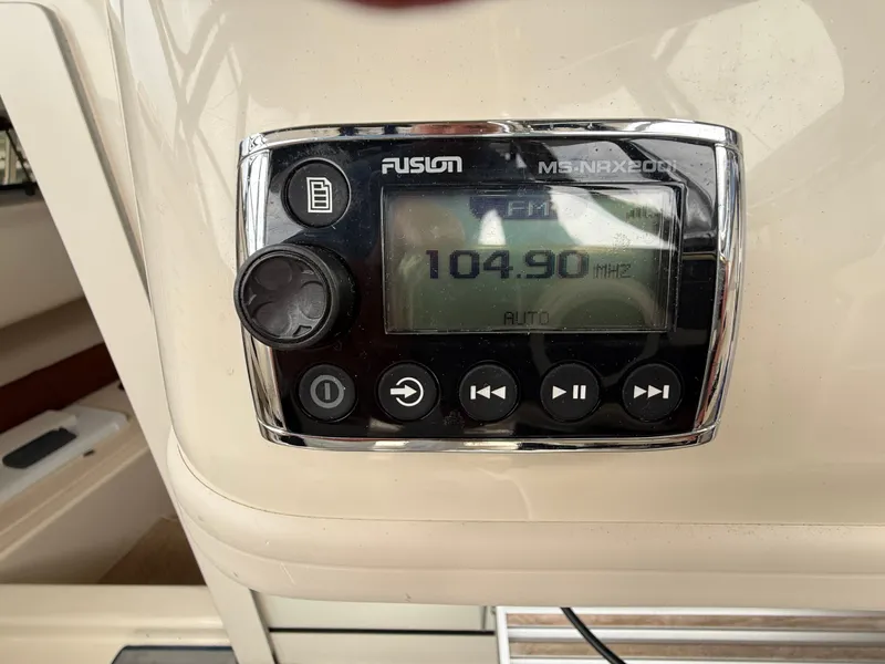 Slide: The Image of A Fusion MS-RA200 radio on a 2015 Grady-White Gulfstream 232 boat. - 24