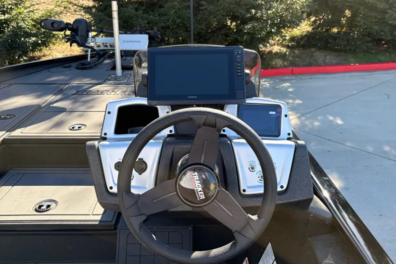 Slide: The Image of Steering console of 2027 Tracker Savage 215 boat with Garmin electronics. - 18