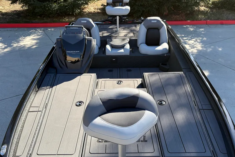 Slide: The Image of 2027 Tracker Savage 215 boat interior with seating and deck layout. - 15