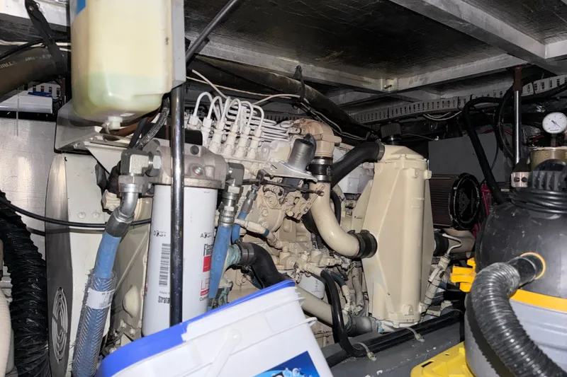 Slide: The Image of Engine room of a 1997 Carver 445 Aft Cabin Motor Yacht, showcasing mechanical components. - 39