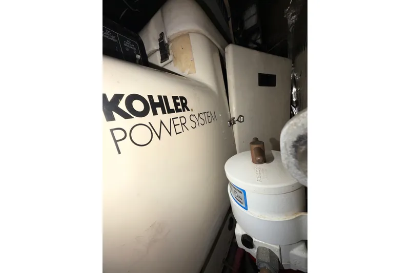 Slide: The Image of Kohler power system in 1997 Carver 445 Aft Cabin Motor Yacht engine room. - 35