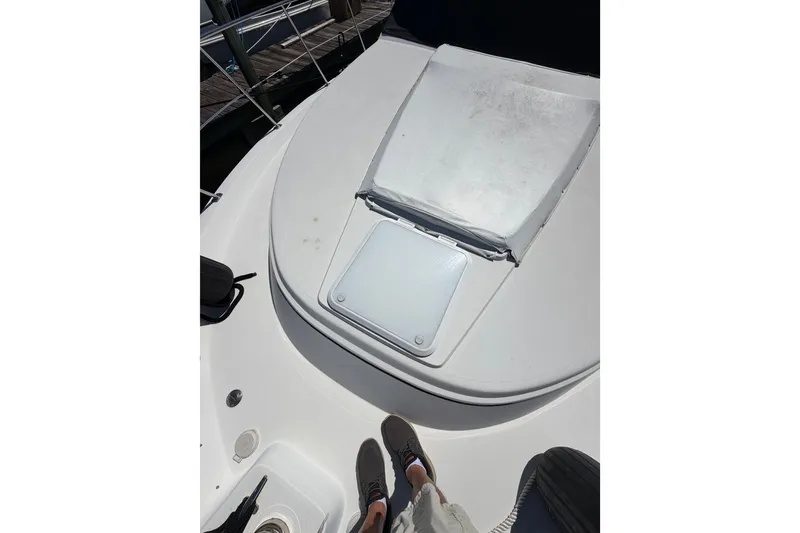Slide: The Image of 1997 Carver 445 Aft Cabin Motor Yacht deck with hatch and railing. - 29
