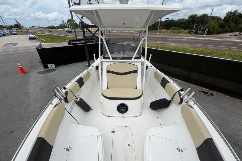 Slide: The Image of 2021 Key Largo 2650WI boat with spacious seating and modern design. - 15