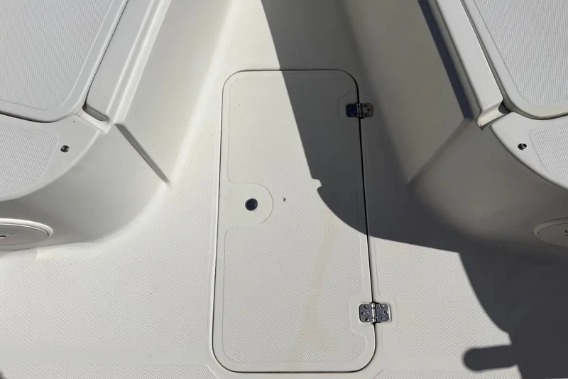 Slide: The Image of The image shows a boat floor with a rectangular access hatch in the center. - 43