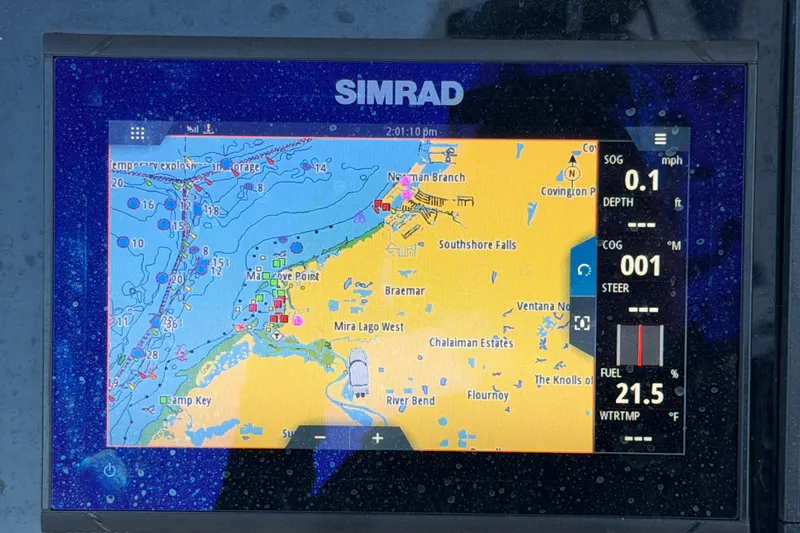 Slide: The Image of Simrad marine GPS display on Key Largo 2650WI, 2021 model, showing navigation map. - 32