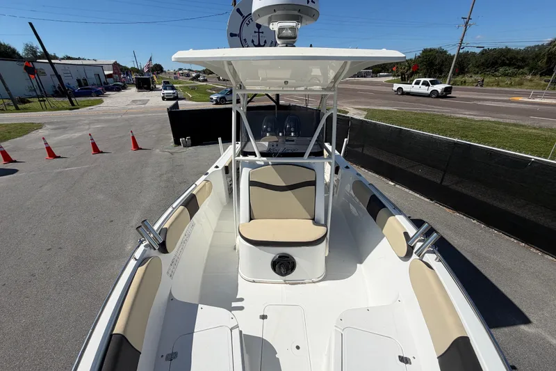 Slide: The Image of 2021 Key Largo 2650WI boat with spacious seating and modern design. - 55
