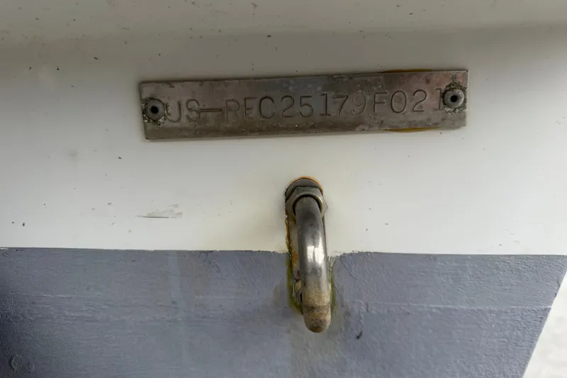Slide: The Image of Hull identification number on a 2021 Key Largo 2650WI boat. - 19