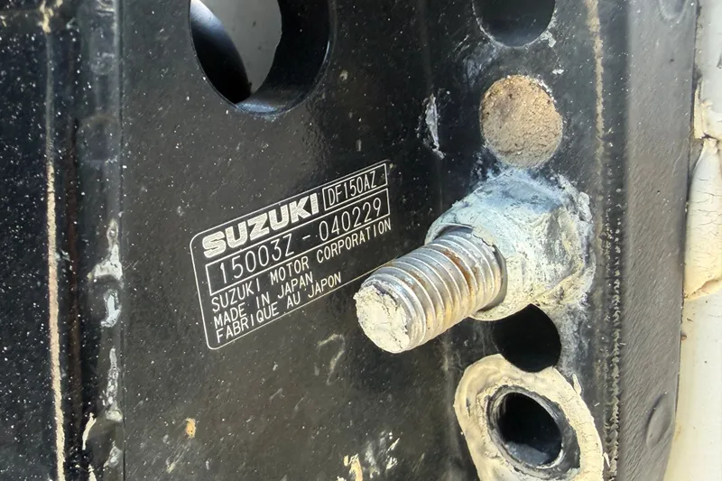 Slide: The Image of Close-up of Suzuki motor label on Key Largo 2650WI, 2021 model. - 82