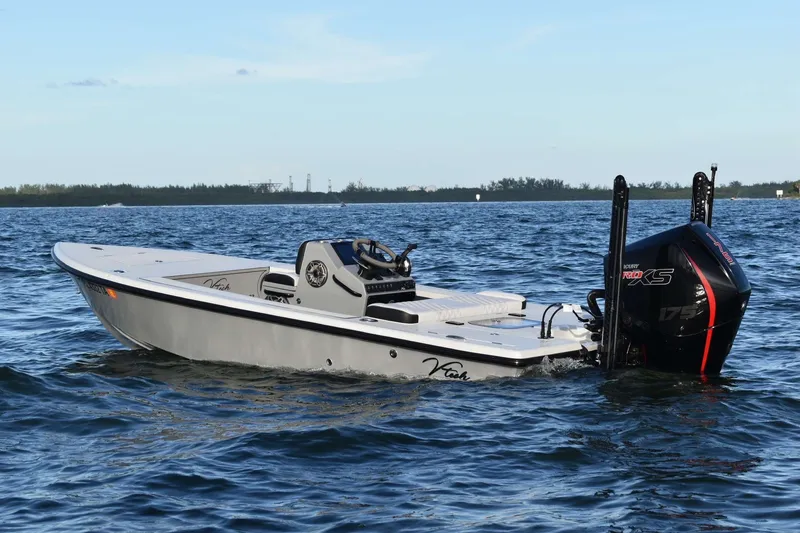 Slide: The Image of 2021 V-Tech 18 Flats boat on open water with Mercury engine. - 4