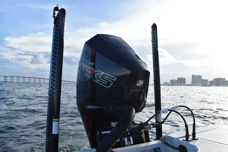 Slide: The Image of 2021 V-Tech 18 Flats boat with Mercury Pro XS engine on open water. - 8