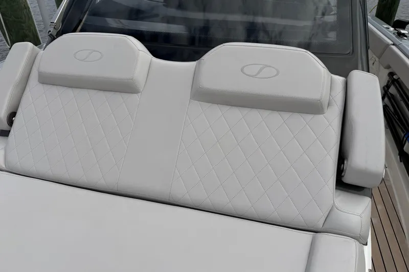 Slide: The Image of Luxurious seating on 2023 Schaefer V33 boat with diamond-stitched upholstery. - 16