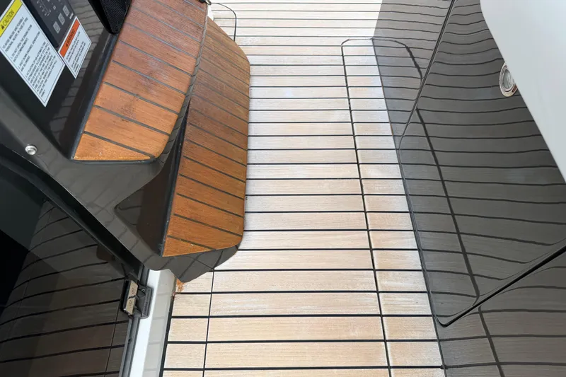 Slide: The Image of Teak deck of 2023 Schaefer V33 yacht, showcasing elegant wood finish and modern design. - 15