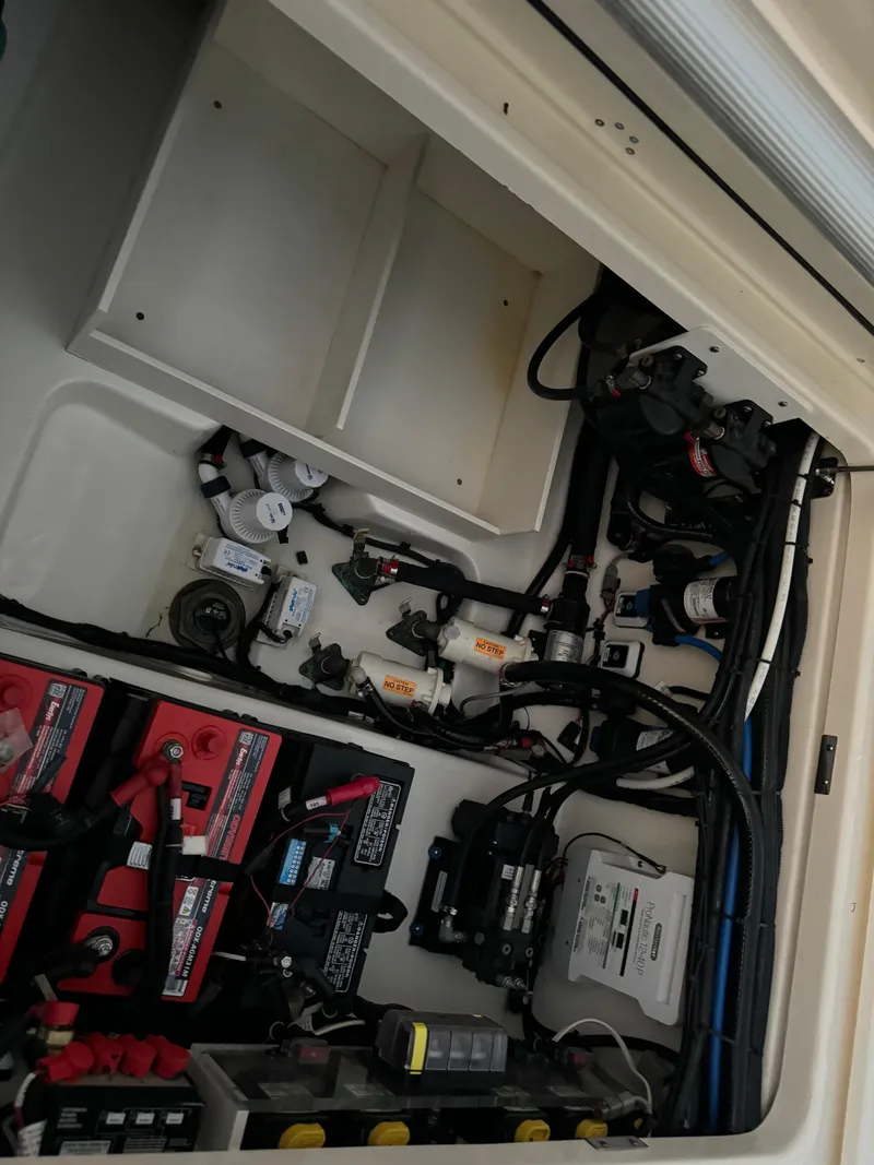 Slide: The Image of Electrical and mechanical components inside a 2021 Boston Whaler 350 Outrage boat. - 31