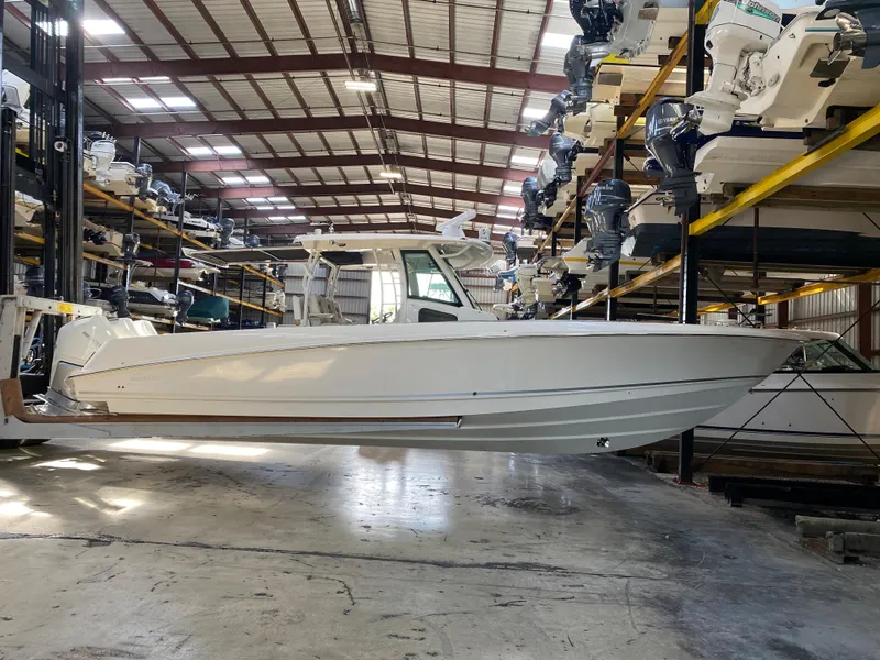 Slide: The Image of 2021 Boston Whaler 350 Outrage in a storage facility. - 5