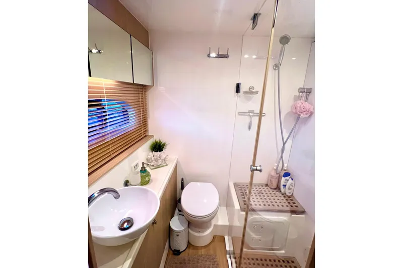 Slide: The Image of Luxurious bathroom in 2020 Aquila 44 Yacht with modern fixtures and elegant design. - 27