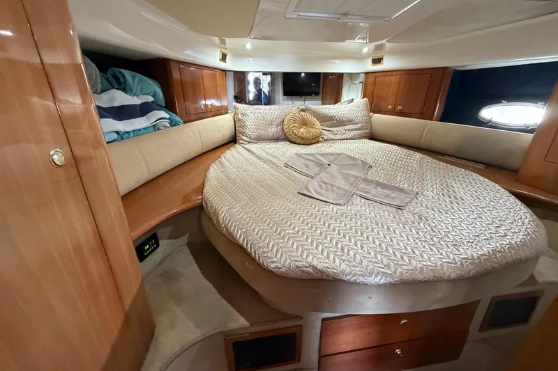 Slide: The Image of Luxurious cabin interior of 2007 Cranchi Atlantique 40 yacht with cozy bedding. - 22