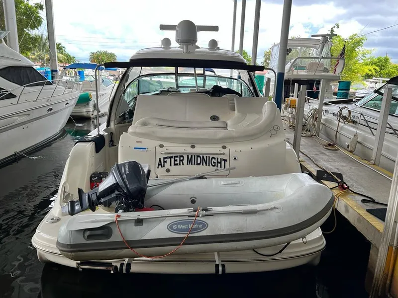 Slide: The Image of 2007 Sea Ray 44 Sundancer docked with dinghy, named After Midnight. - 16