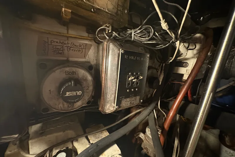 Slide: The Image of Electrical panel and wiring inside a 1989 Topaz 44 Sportfisherman boat. - 28