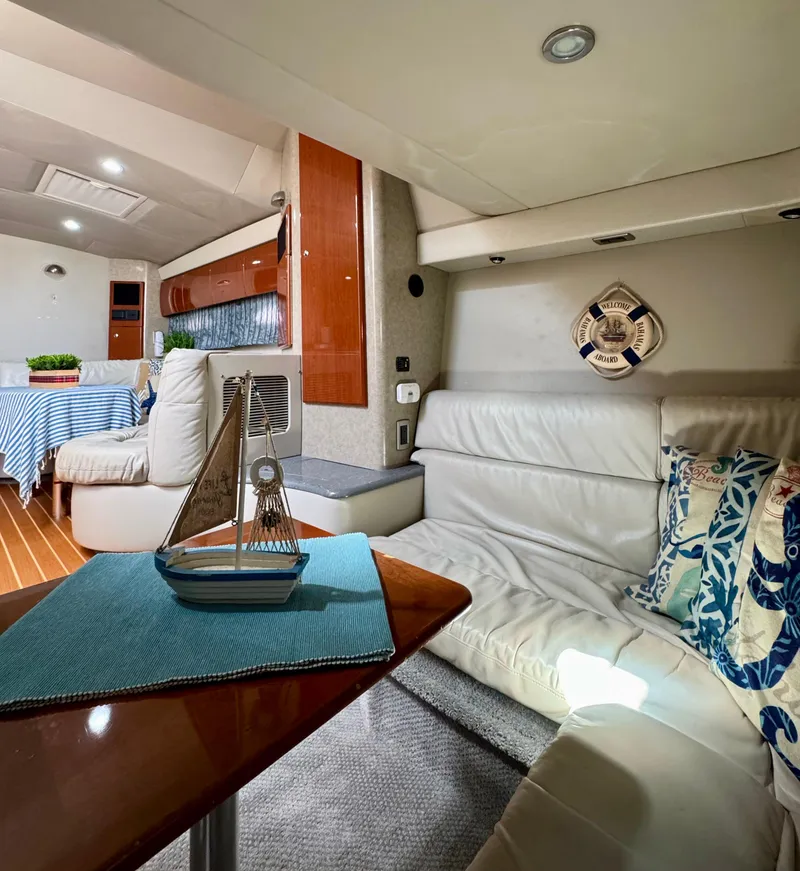 Slide: The Image of Luxurious 2006 Formula 40pc yacht interior with elegant seating and nautical decor. - 24