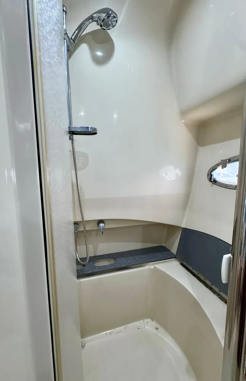 Slide: The Image of 2006 Formula 40pc yacht shower interior with modern fixtures and sleek design. - 22