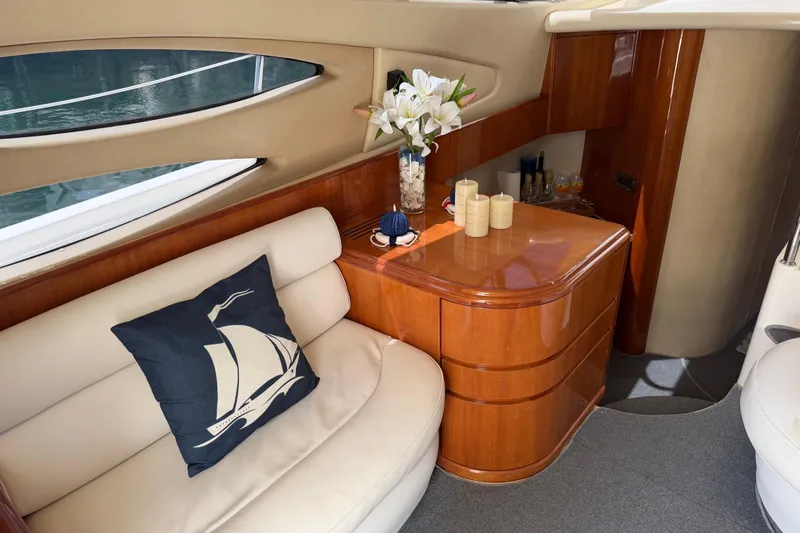 Slide: The Image of Luxurious interior of a 2004 Azimut 39E yacht with elegant seating and decor. - 17