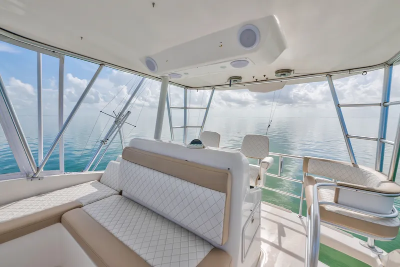 Slide: The Image of Luxurious interior of 2005 Luhrs 41 Convertible yacht with ocean view. - 24