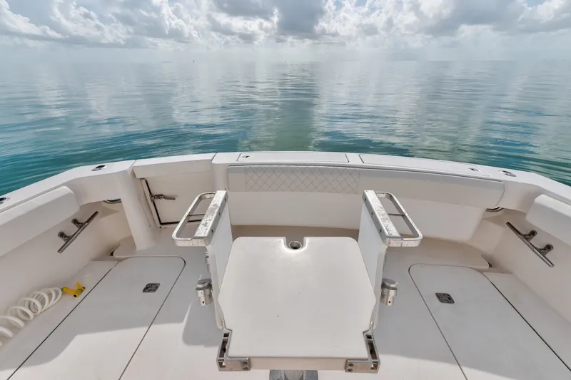 Slide: The Image of 2005 Luhrs 41 Convertible boat deck overlooking calm ocean waters. - 31