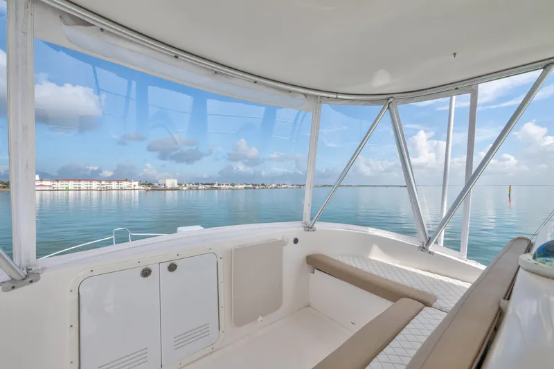 Slide: The Image of 2005 Luhrs 41 Convertible boat interior with ocean view and clear skies. - 26
