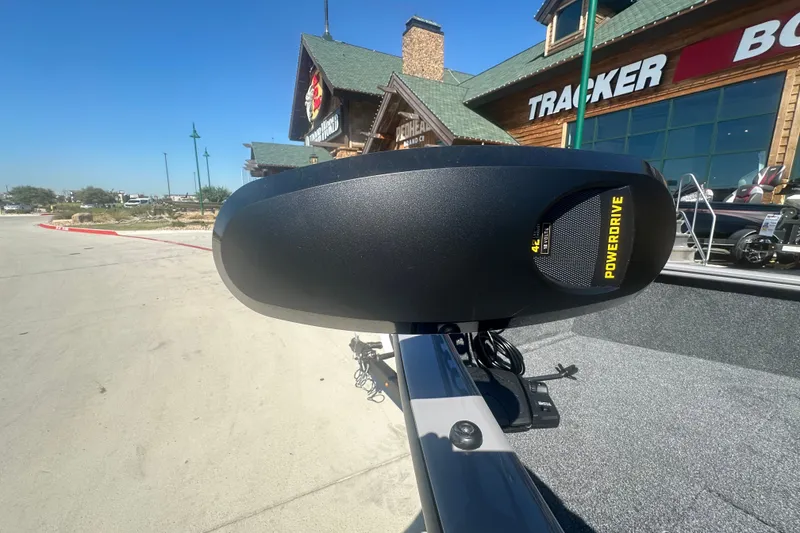 Slide: The Image of 2027 Tracker Super Guide V-16 SC boat with PowerDrive motor at dealership. - 14