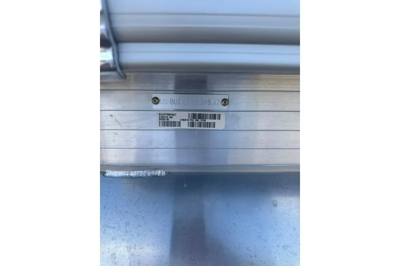 Slide: The Image of Hull identification number on 2027 Sun Tracker Bass Buggy 18 DLX pontoon boat. - 82