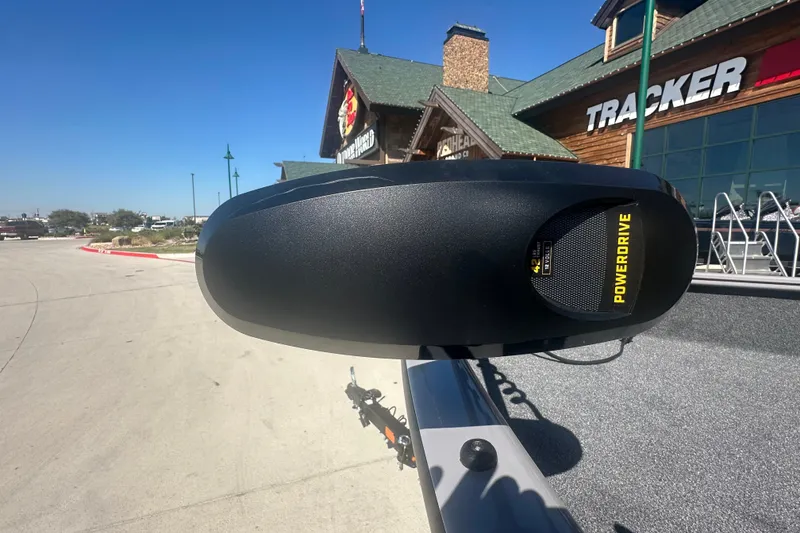 Slide: The Image of 2027 Tracker Pro Guide V-16 WT boat with PowerDrive motor at dealership. - 15