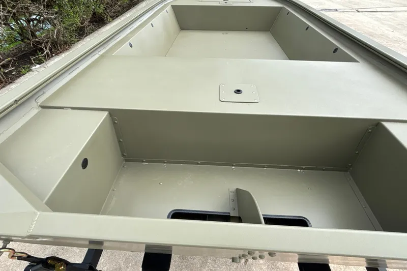 Slide: The Image of 2027 Tracker Grizzly 1648 Utility boat interior, showcasing spacious, durable design. - 13