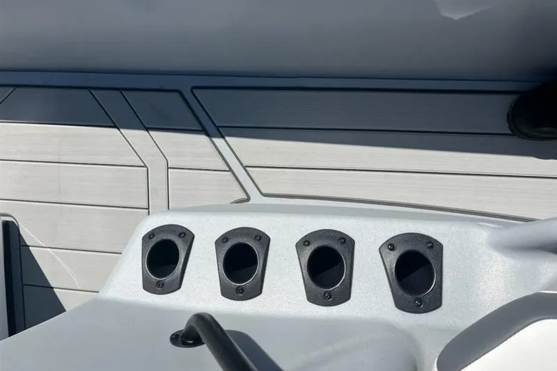 Slide: The Image of 2027 Tracker Bass Tracker Classic CC boat rod holders on sleek deck. - 14