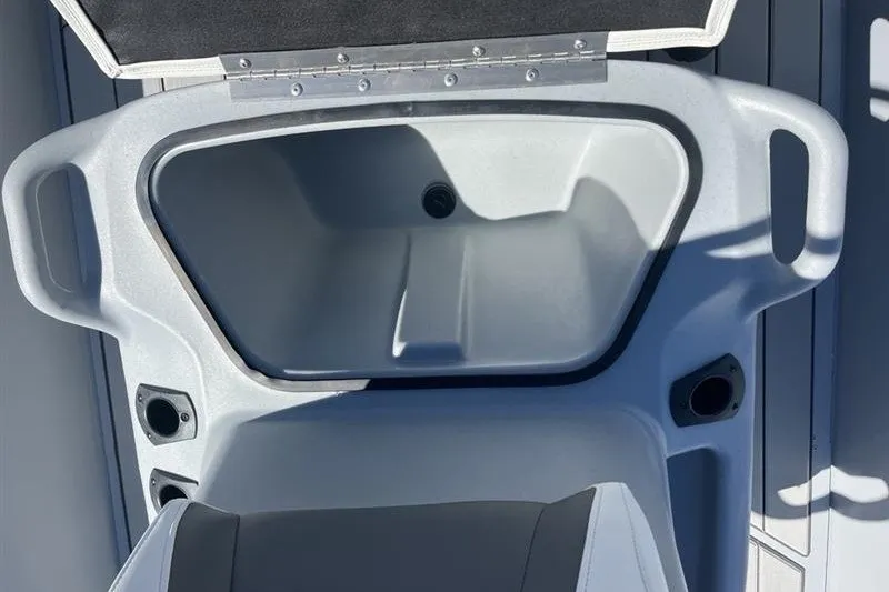 Slide: The Image of Open storage compartment on 2027 Tracker Bass Tracker Classic CC boat. - 15