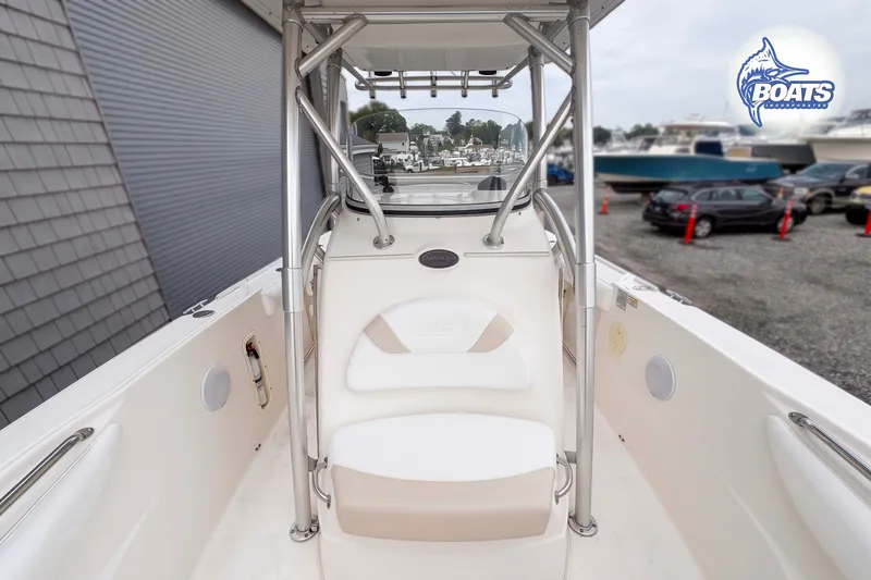 Slide: The Image of 2006 Boston Whaler 270 Outrage boat interior with seating and sturdy framework. - 5