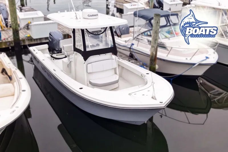 The Image of 2024 Parker 2300 Special Edition boat docked, featuring Garmin equipment and sleek design. - 0