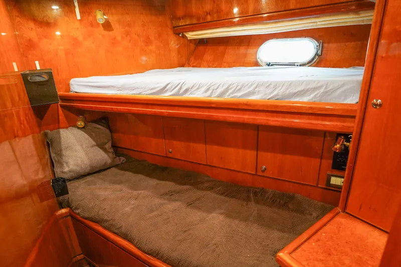 Slide: The Image of Cozy cabin interior of 2001 Monte Fino 82MY yacht with wooden bunk beds. - 47