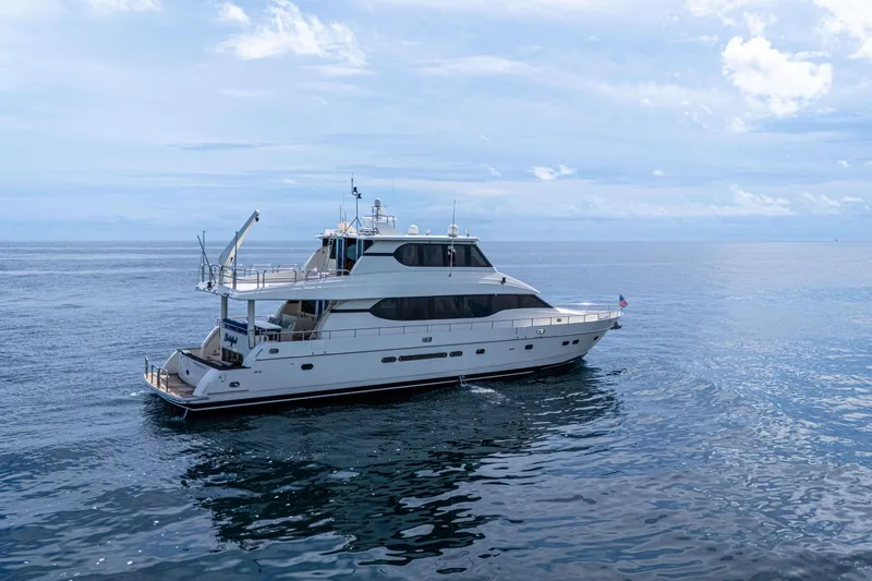 Slide: The Image of Luxury Monte Fino 82MY yacht from 2001 cruising on open sea under clear skies. - 5