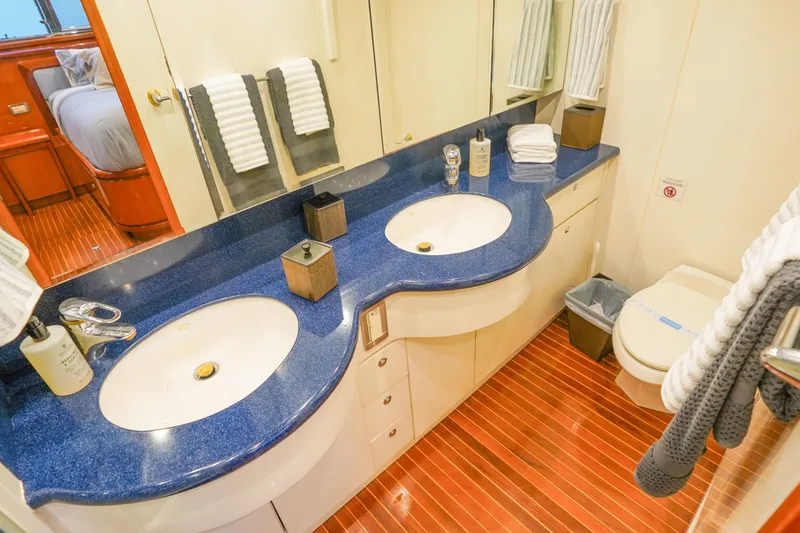 Slide: The Image of Luxurious bathroom in 2001 Monte Fino 82MY yacht with dual sinks and elegant design. - 41