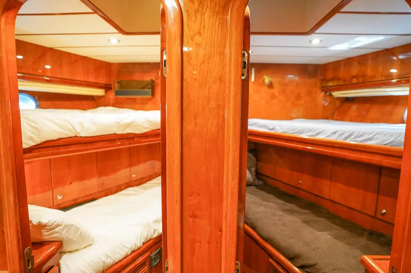 Slide: The Image of Luxurious wooden interior of 2001 Monte Fino 82MY yacht with cozy bunk beds. - 50
