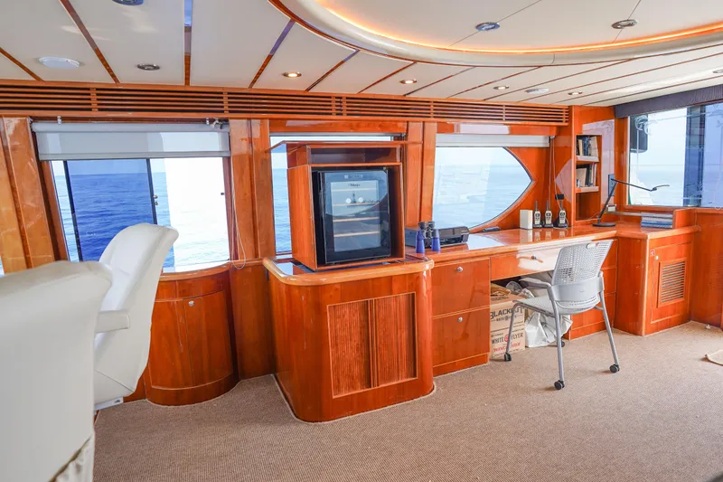 Slide: The Image of Luxurious interior of 2001 Monte Fino 82MY yacht with ocean view and elegant wood finish. - 32