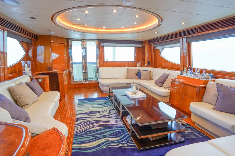 Slide: The Image of Luxurious interior of 2001 Monte Fino 82MY yacht with elegant seating and modern decor. - 25
