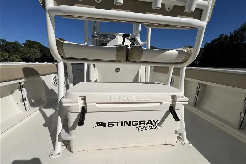 Slide: The Image of 2019 Stingray 236 CC boat interior with Engel cooler and seating. - 16
