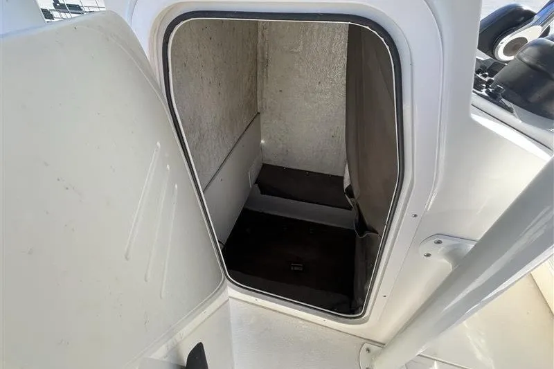 Slide: The Image of Interior cabin view of a 2019 Stingray 236 CC boat. - 20