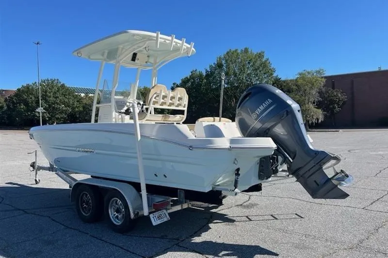 Slide: The Image of 2019 Stingray 236 CC boat on trailer with Yamaha outboard motor. - 2