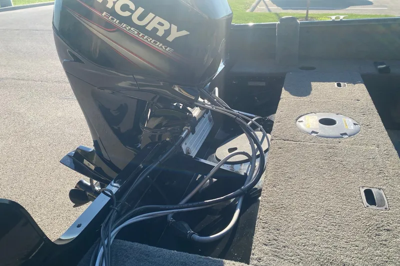 Slide: The Image of 2014 Lund 1650 Rebel XL SS boat with Mercury FourStroke engine, interior view. - 7